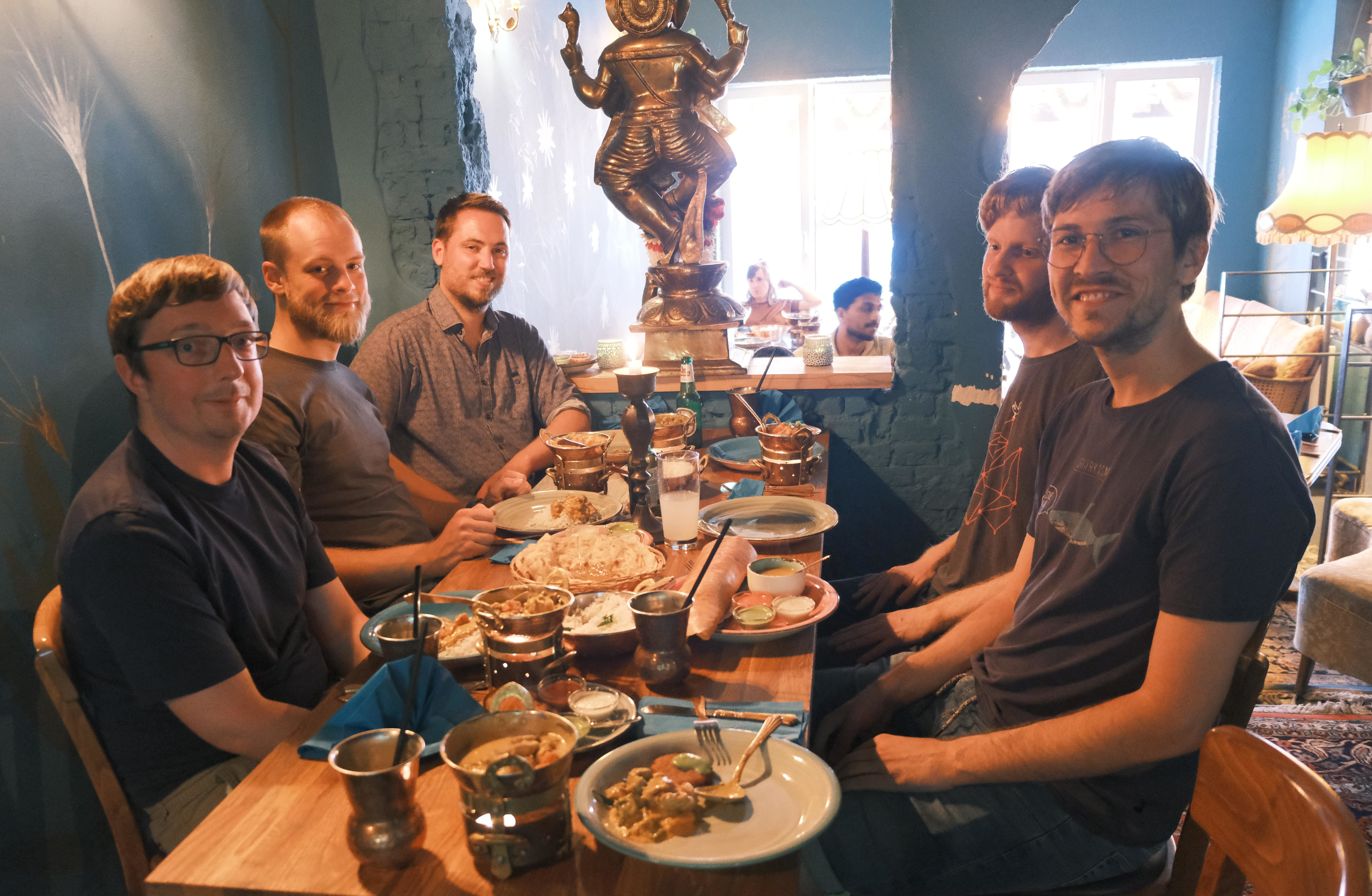 Developers sharing knowlege &amp; dinner in an India restaurant